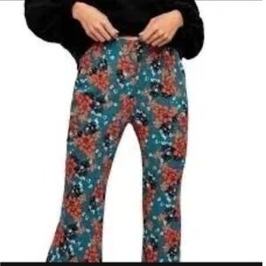 Free People Floral  – "Can't Take My Eyes Off You" Flare Pants Size M